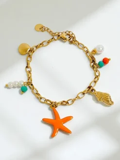 Biżuteria^Royalfashion Bransoletka Callista Mare – złoty łańcuszek z muszlami i gwiazdą morską
