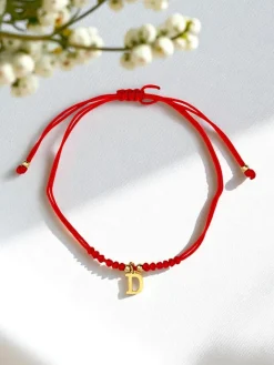 Biżuteria^Royalfashion Bransoletka damska z literką "D" czerwony