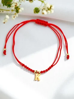 Biżuteria^Royalfashion Bransoletka damska z literką "K" czerwony