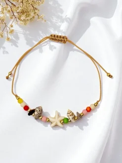 Biżuteria^Royalfashion Bransoletka damska z muszelką Marina Belle złoty