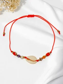 Biżuteria^Royalfashion Bransoletka damska z muszelką Oceania Grace pomarańczowy