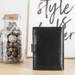 Portfele^Royalfashion Czarny portfel męski zapinany guzikiem - Akcesoria