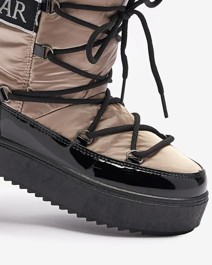 Śniegowce^Royalfashion Damskie lakierowane buty a'la śniegowce w złoto- różowym kolorze Fursav- Obuwie złoty