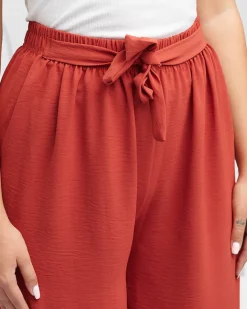 Spodnie Materiałowe^Royalfashion Damskie szerokie spodnie palazzo w kolorze m- Odzież czerwony
