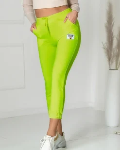 Spodnie Dresowe^Royalfashion Neonowe żółte damskie spodnie dresowe z naszywką- Odzież żółty