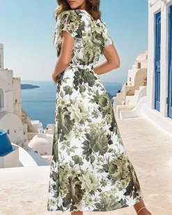 Sukienki Długie^Royalfashion Sukienka damska midi w kwiaty Wielokolorowe