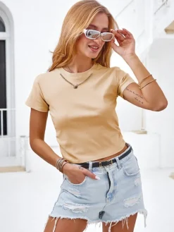 Bluzki / Koszule / Koszulki^Royalfashion Bawełniany damski t-shirt z marszczeniami po bokach, łańcuszkiem i brokatem Jasny beż