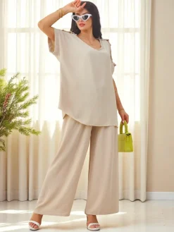 Komplety Damskie^Royalfashion Bawełniany damski komplet z krótkim rękawem i poszerzanymi spodniami Jasny beż