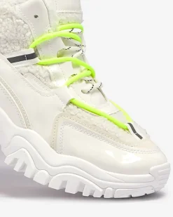 Śniegowce|Ocieplane^Royalfashion Białe sportowe buty damskie z futerkiem i owymi zielonymi sznurówkami Sagglo neon