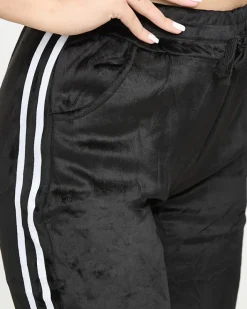 Spodnie Dresowe^Royalfashion Czarne damskie ocieplane welurowe spodnie dresowe z lampasami