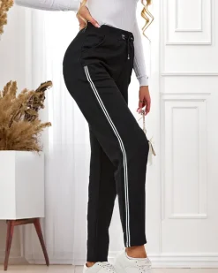 Spodnie Dresowe^Royalfashion Czarne damskie spodnie dresowe z lampasami