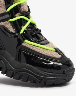 Śniegowce|Ocieplane^Royalfashion Czarne sportowe buty damskie z futerkiem i neonowymi żółtymi sznurówkami Adbo czarny
