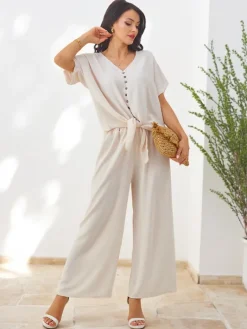 Komplety Damskie^Royalfashion Damski komplet casualowy z bluzką z krótkim rękawem i szerokimi spodniami Jasny beż