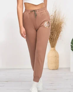 Spodnie Dresowe^Royalfashion Damskie spodnie dresowe w kolorze m brązowy