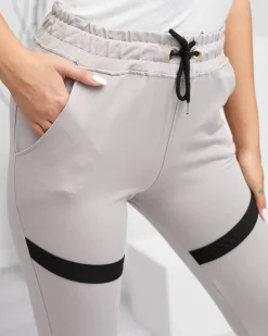 Spodnie Dresowe^Royalfashion Damskie spodnie dresowe w kolorze jasnoszarym Jasny szary