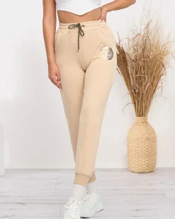 Spodnie Dresowe^Royalfashion Damskie spodnie dresowe w kolorze m beżowy