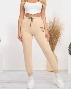 Spodnie Dresowe^Royalfashion Damskie spodnie dresowe w kolorze m beżowy