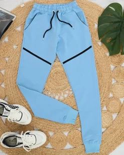 Spodnie Dresowe^Royalfashion Damskie spodnie dresowe w kolorze niebieskim Ecru