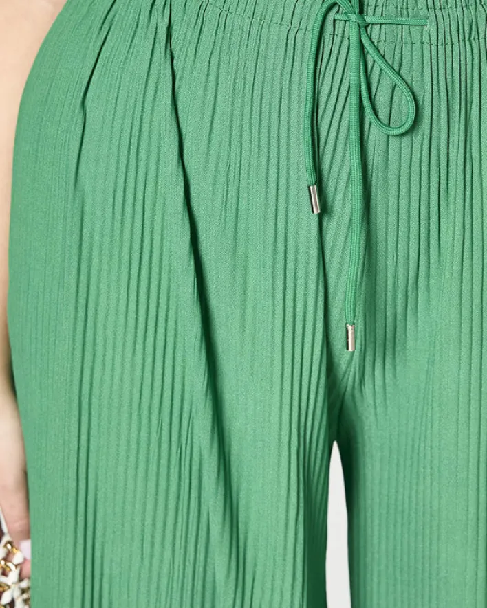 Spodnie Materiałowe^Royalfashion Damskie szerokie plisowane spodnie palazzo w m kolorze zielony