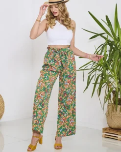 Spodnie Materiałowe^Royalfashion Damskie zielone spodnie typu palazzo w pomarańczowe kwiaty zielony