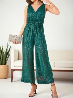 Kombinezony^Royalfashion Długi kombinezon damski z cekinami zielony