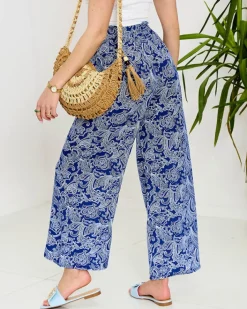 Spodnie Materiałowe^Royalfashion Granatowe damskie spodnie materiałowe z printem Granatowy