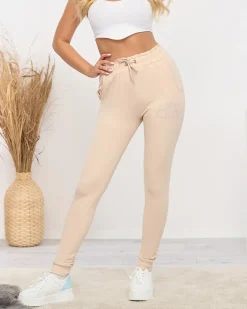 Spodnie Dresowe^Royalfashion Jasnobeżowe damskie spodnie dresowe z cyrkoniami jasny brązowy