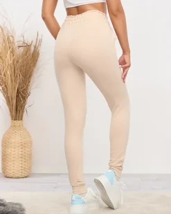 Spodnie Dresowe^Royalfashion Jasnobeżowe damskie spodnie dresowe z cyrkoniami jasny brązowy