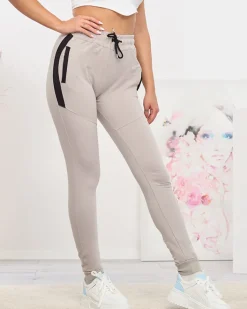 Spodnie Dresowe^Royalfashion Jasnoszare damskie spodnie dresowe z czarnymi wstawkami Jasny szary