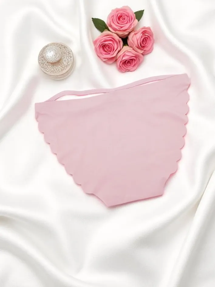 Figi^Royalfashion Laserowo cięte Majtki damskie typu figi z ozdobnymi paseczkami Edge Chic różowy