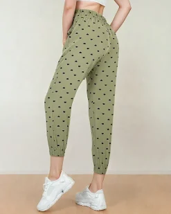 Spodnie Materiałowe^Royalfashion Materiałowe spodnie damskie w serduszka zielony