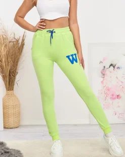 Spodnie Dresowe^Royalfashion Neonowe zielone damskie spodnie dresowe z kolorową naszywką zielony
