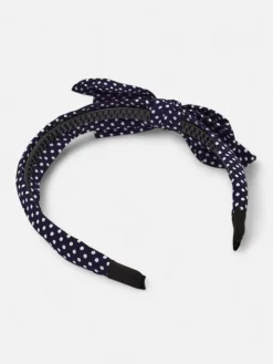 Akcesoria Do Włosów^Royalfashion Opaska damska w kropeczki z kokardką Granatowy