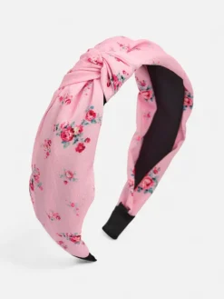 Akcesoria Do Włosów^Royalfashion Opaska do włosów z pleceniem w kwiaty różowy
