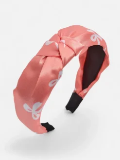 Akcesoria Do Włosów^Royalfashion Opaska do włosów satynowa z pleceniem z nadrukiem różowy
