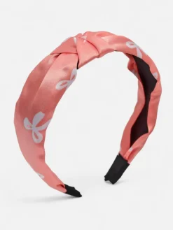 Akcesoria Do Włosów^Royalfashion Opaska do włosów satynowa z pleceniem z nadrukiem różowy
