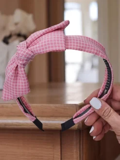 Akcesoria Do Włosów^Royalfashion Opaska do włosów z kokardką w kratkę Gosia różowy