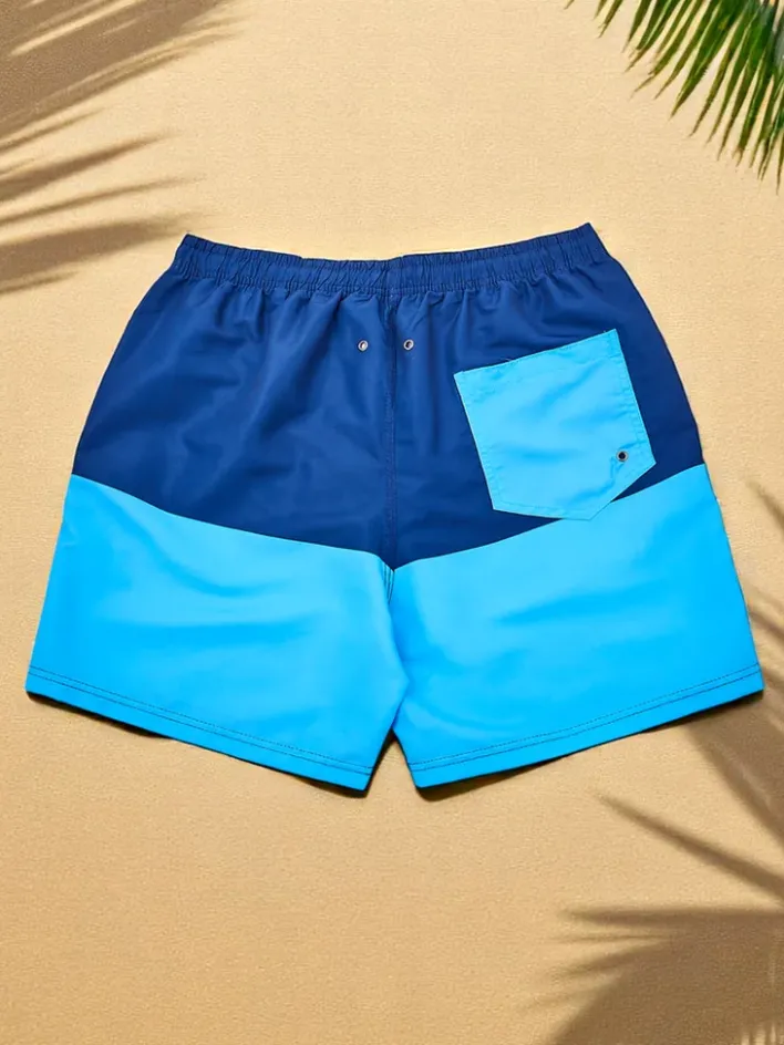 Spodnie^Royalfashion Sportowe męskie krótkie spodenki z ochronną siateczką Głęboki błękit nieba