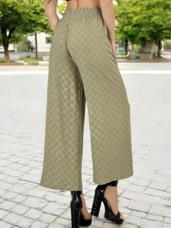 Spodnie Materiałowe^Royalfashion Szerokie spodnie damskie w kratę zielony