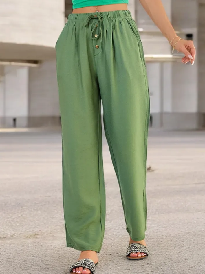 Spodnie Materiałowe^Royalfashion Szerokie spodnie damskie materiałowe zielony