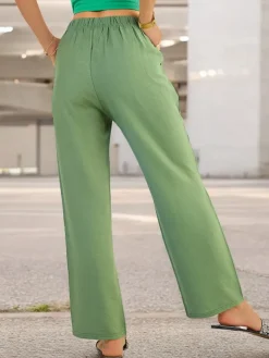 Spodnie Materiałowe^Royalfashion Szerokie spodnie damskie materiałowe zielony