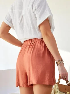 Szorty|Krótkie Spodenki^Royalfashion Wiskozowe krótkie spodenki damskie różowy