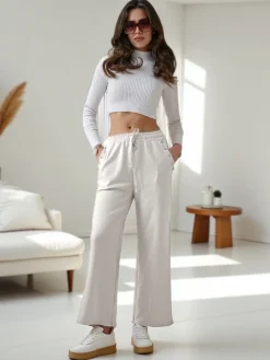 Spodnie Materiałowe|Spodnie Dresowe^Royalfashion Wiskozowe szerokie spodnie damskie dresowe z cyrkoniami biały