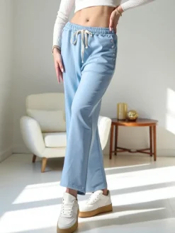 Spodnie Materiałowe|Spodnie Dresowe^Royalfashion Wiskozowe szerokie spodnie damskie dresowe z cyrkoniami Ecru