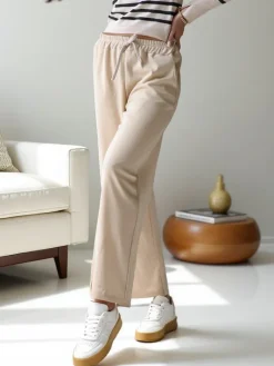 Spodnie Materiałowe|Spodnie Dresowe^Royalfashion Wiskozowe szerokie spodnie damskie dresowe beżowy