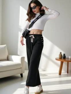 Spodnie Materiałowe|Spodnie Dresowe^Royalfashion Wiskozowe szerokie spodnie damskie dresowe z cyrkoniami czarny