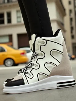 Sneakersy^Royalfashion Wysokie sportowe buty damskie z ukrytym koturnem Oblaffi biały