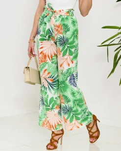 Spodnie Materiałowe^Royalfashion Zielone damskie spodnie palazzo z roślinnym wzorem zielony