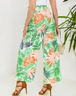 Spodnie Materiałowe^Royalfashion Zielone damskie spodnie palazzo z roślinnym wzorem zielony