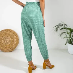 Plus Size|Spodnie Materiałowe^Royalfashion Zielone damskie spodnie materiałowe w groszki PLUS SIZE zielony